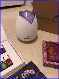 Young Living Essential Oil Premium Starter Kit with Rose Mist Diffuser used once
